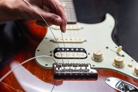 How Often to Change Electric Guitar Strings: A Symphony of Maintenance and Madness